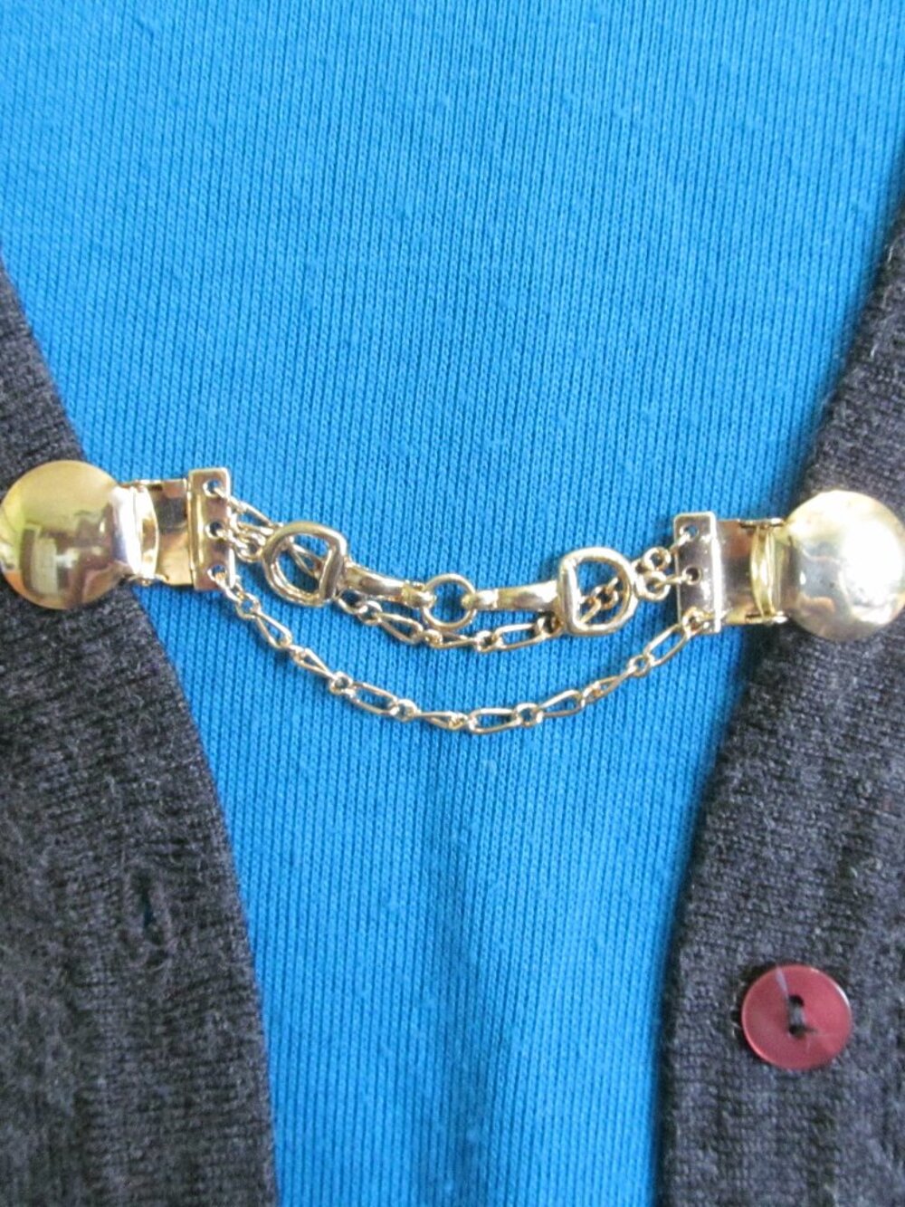 Vintage cardigan guard sweater clip